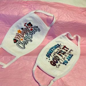 NWOT Merry Christmas design face masks; you get two of them